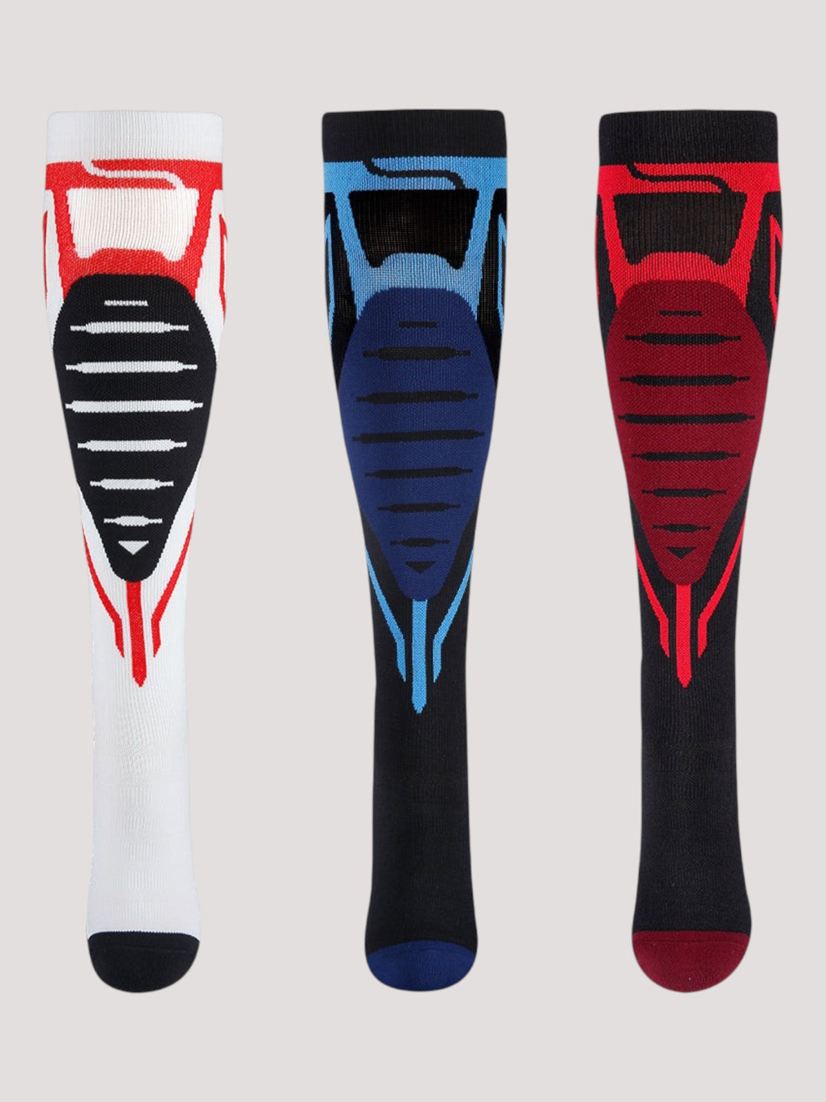 Kotyss performance athletic knee-high compression socks in white, blue, and black with seamless, breathable padding.