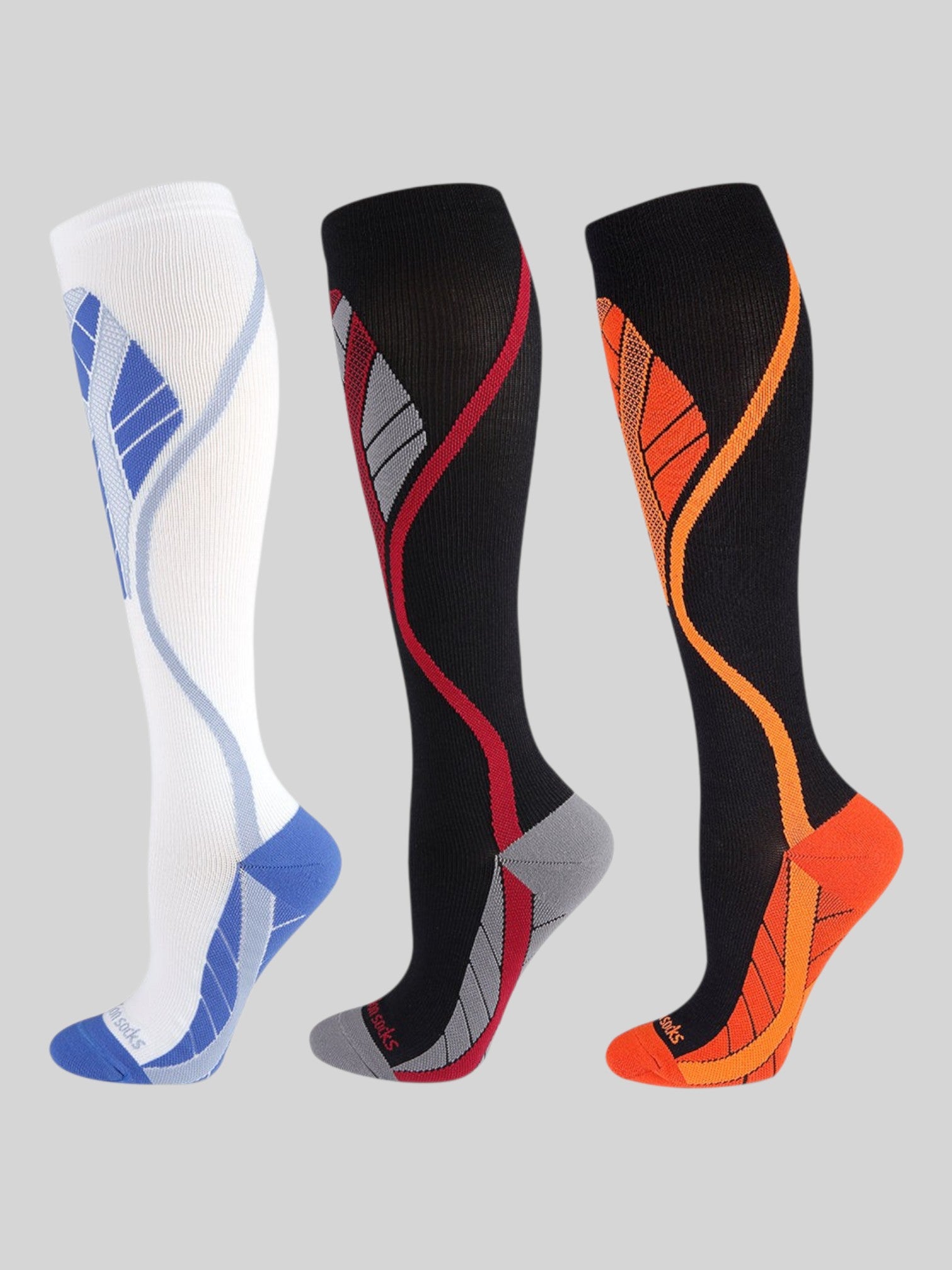 Kotyss knee high athletic compression socks in white-blue, black-red, and black-orange with seamless padded design
