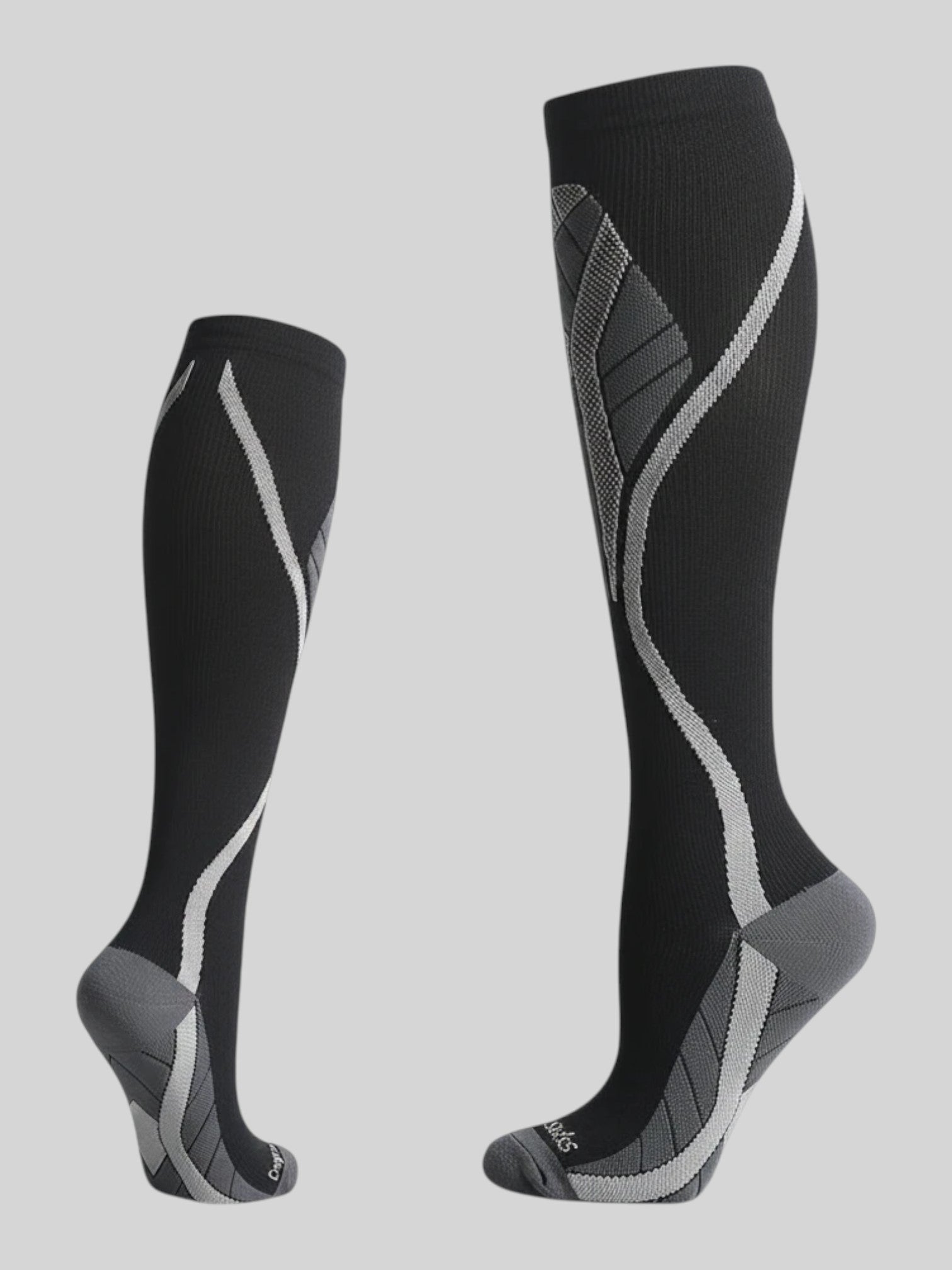 Kotyss black and grey knee-high athletic compression socks with seamless breathable fabric and targeted padding