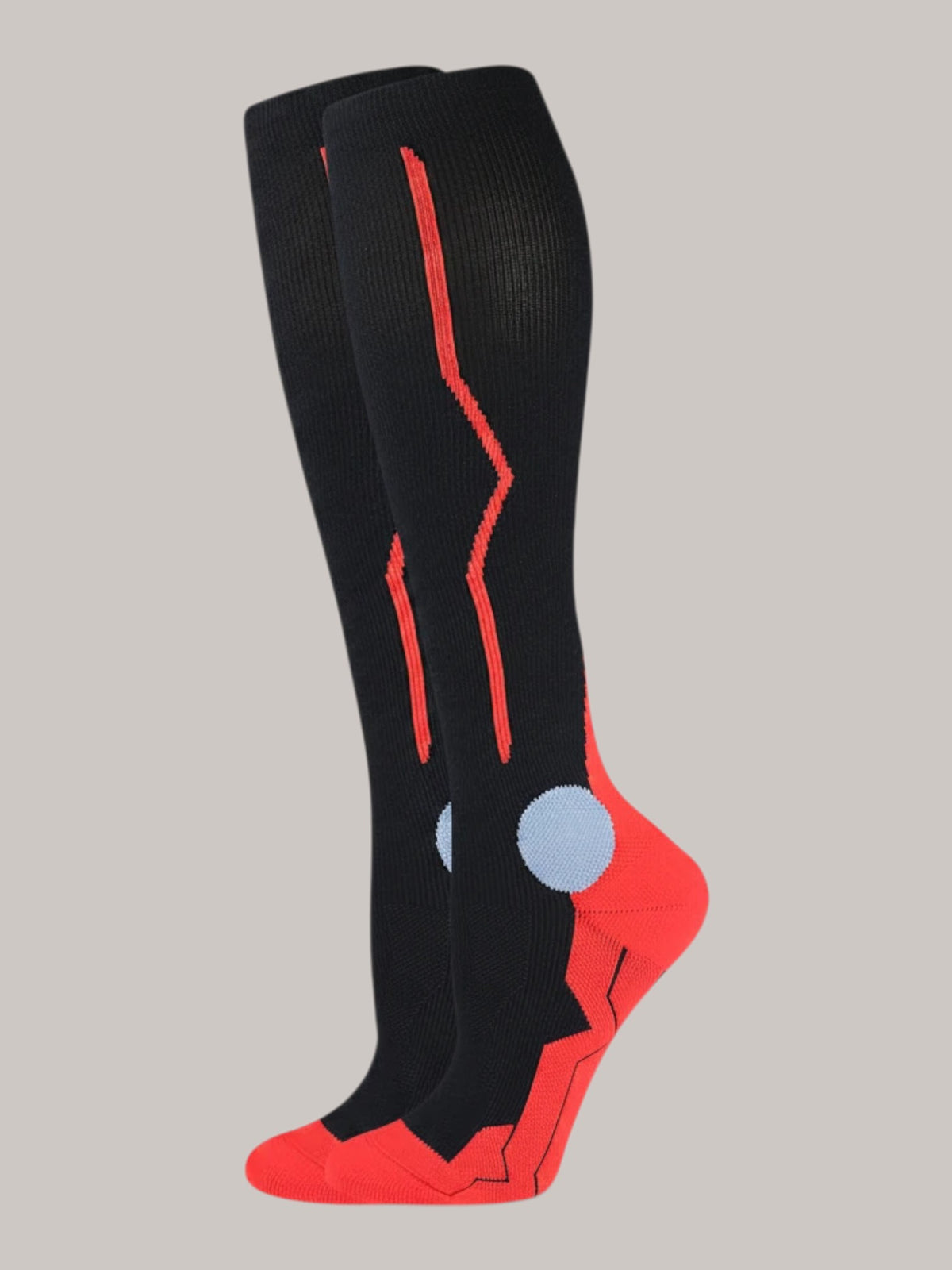 Kotyss black and red knee-high athletic compression socks with seamless breathable fabric and padded support