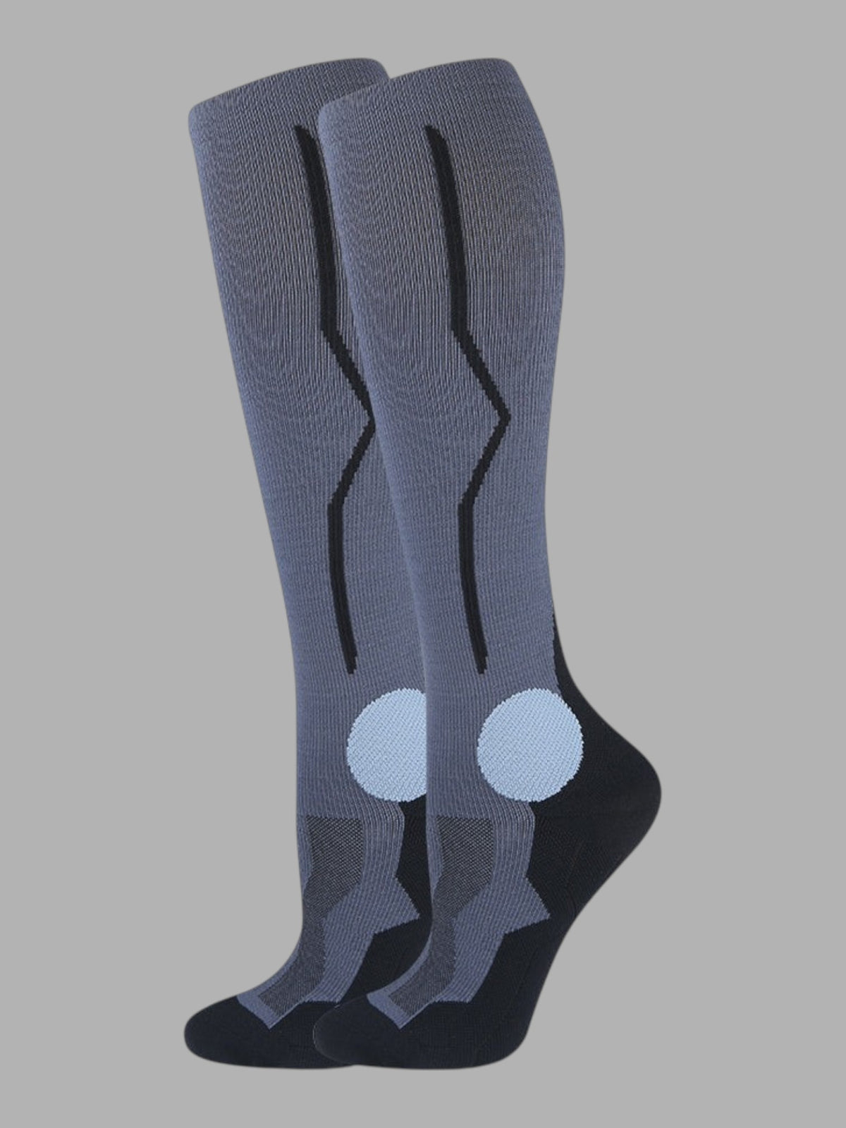 Kotyss grey knee-high compression socks with black accents, seamless design, and targeted padding for athletic support.