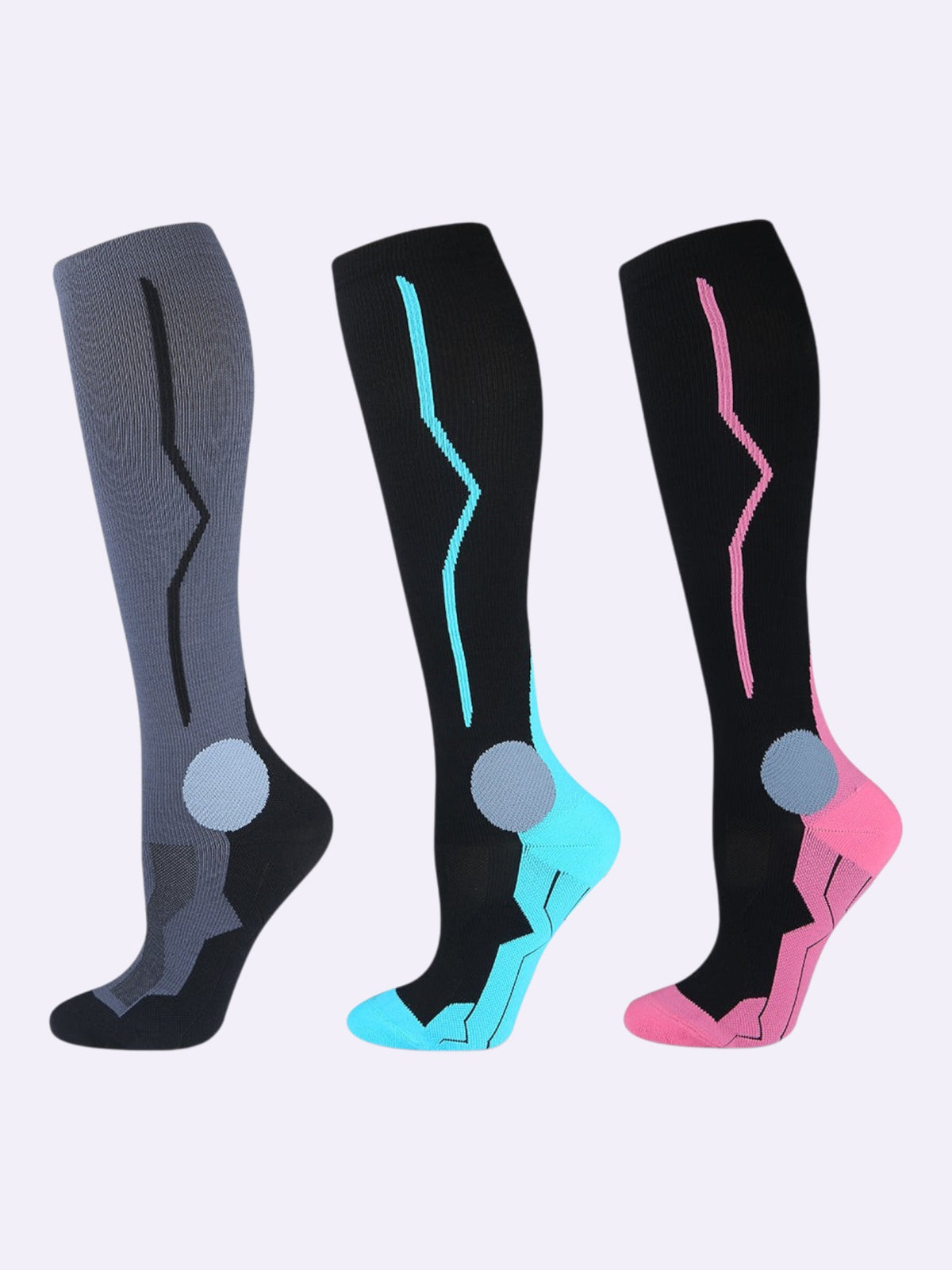 Kotyss knee-high compression socks in grey, black-blue, and black-pink with seamless, breathable athletic design.