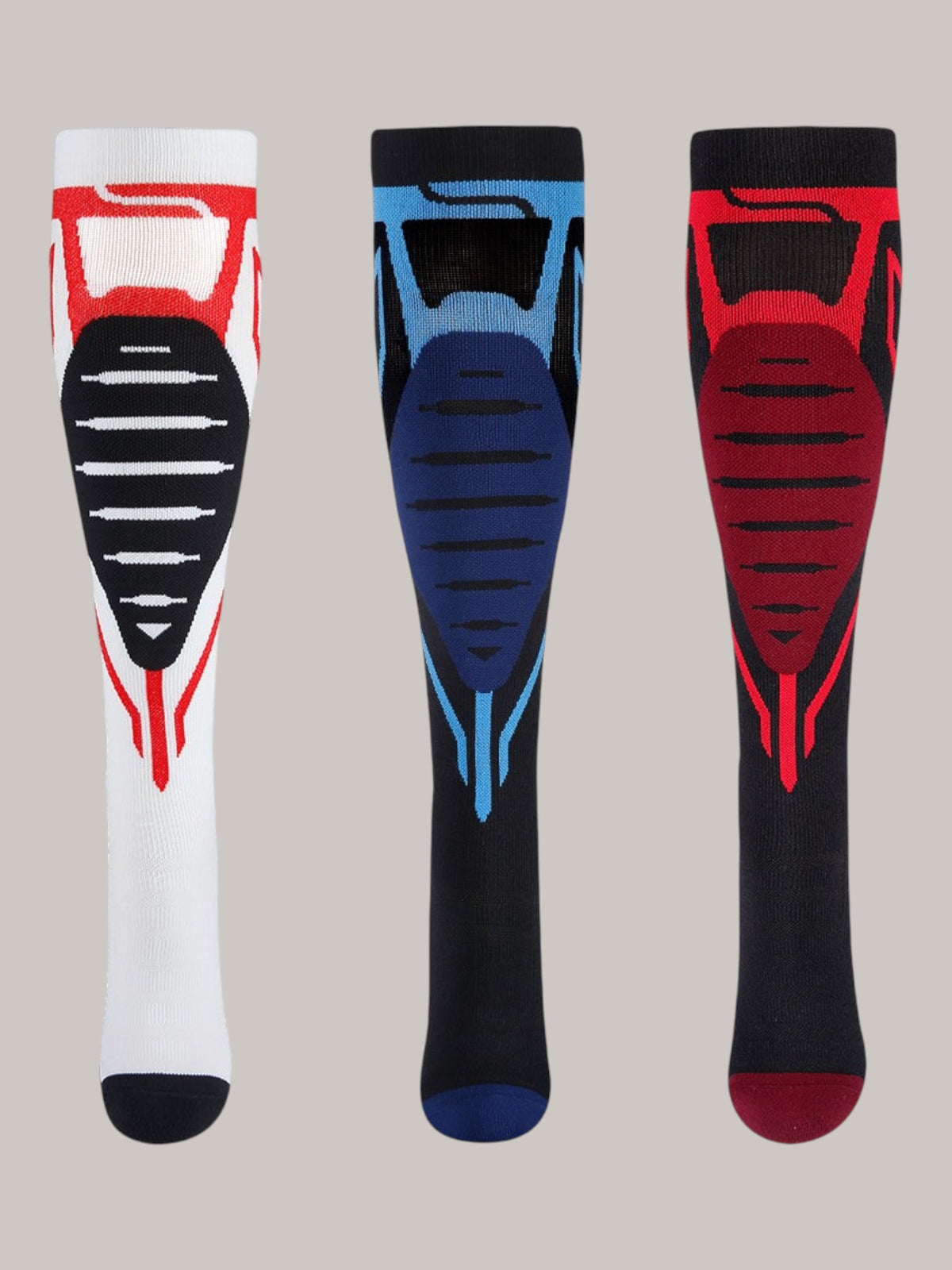 Kotyss knee-high athletic compression socks in red, blue, and black with seamless breathable padding.