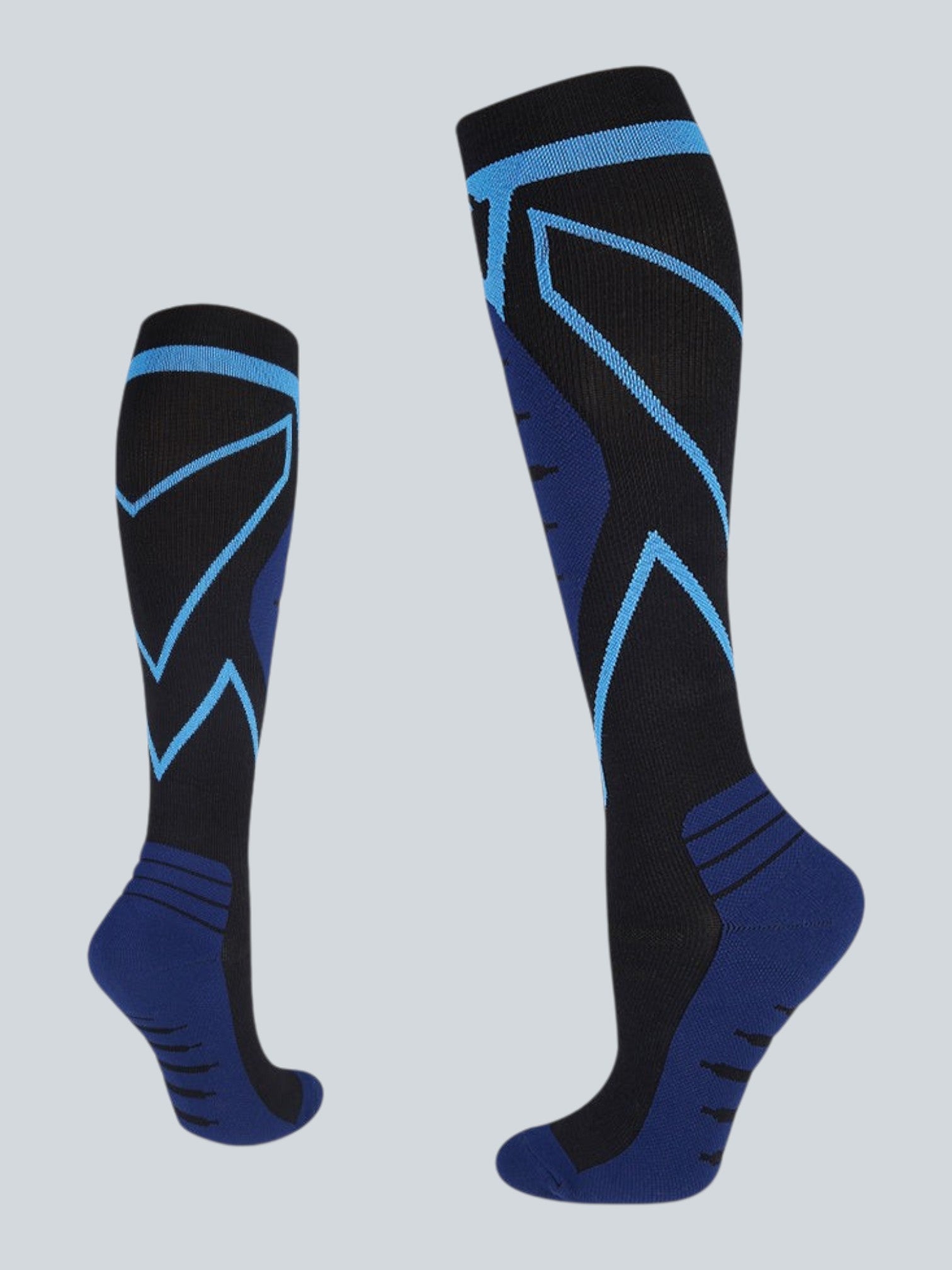 Kotyss unisex knee-high compression socks in black and blue with seamless, breathable athletic design and padding.