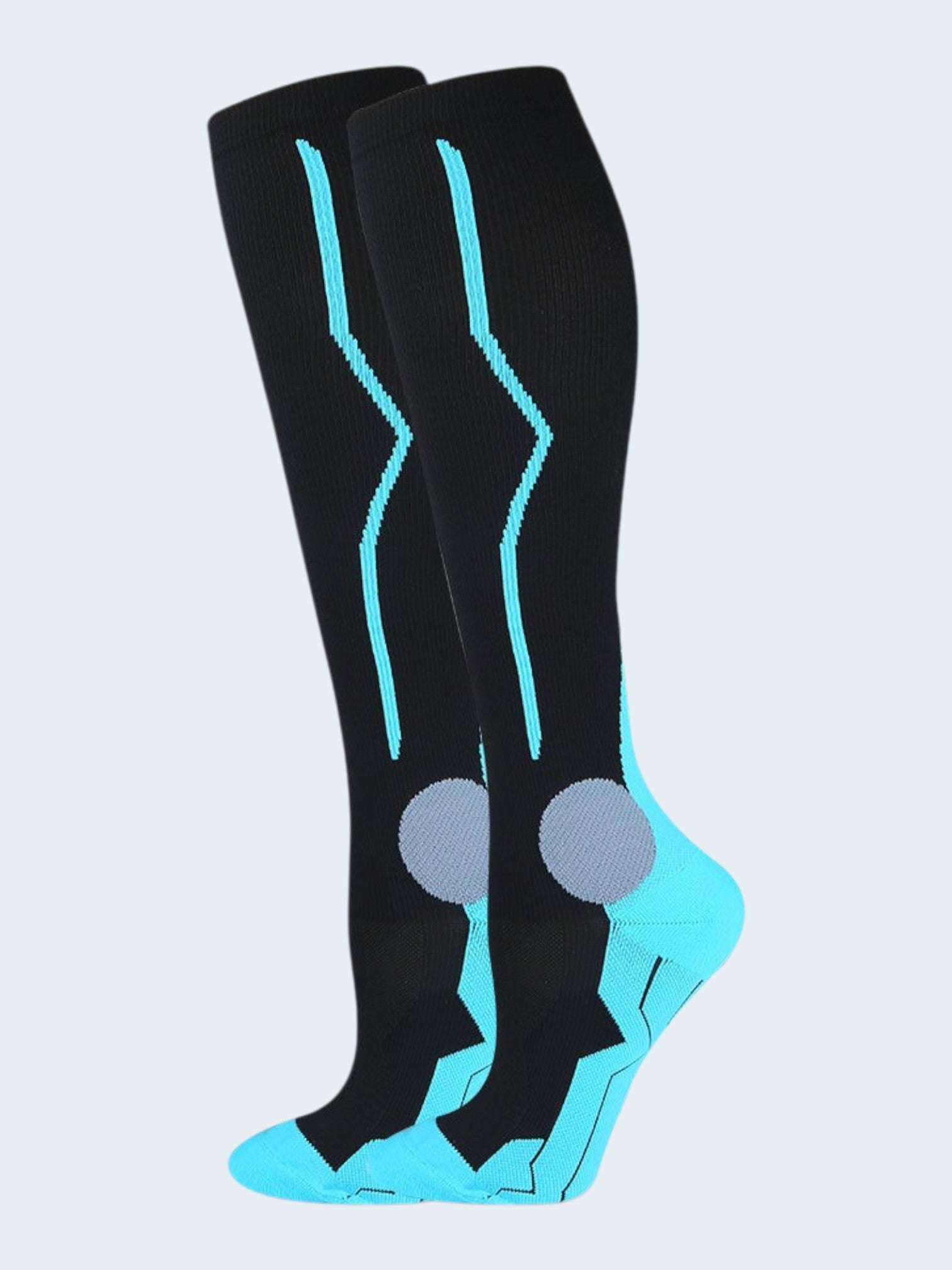 Kotyss knee high compression socks in black with bright blue accents and grey heel padding for athletic support.