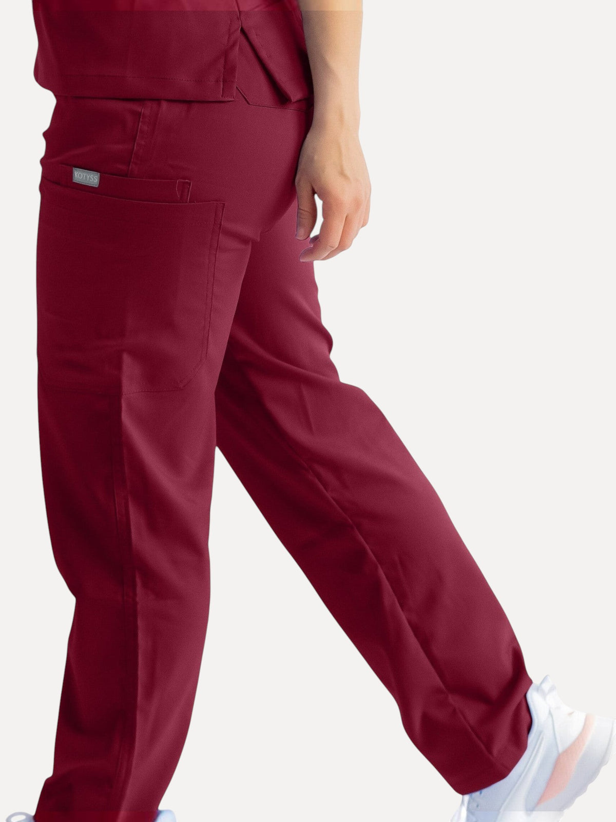 Kotyss burgundy straight cut medical scrub pants with multiple utility pockets and breathable 4-way stretch fabric