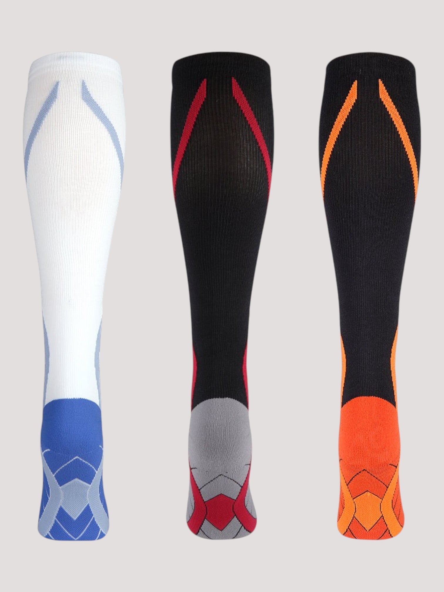 Kotyss knee high compression socks in white, black with red, and black with orange, featuring seamless breathable fabric.