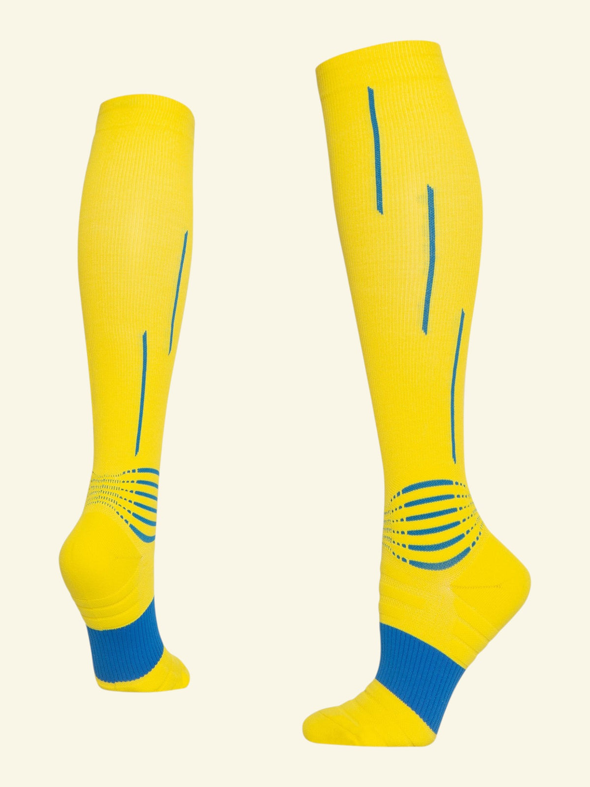 Kotyss knee-high compression socks in bright yellow with blue accents, featuring seamless, breathable fabric.